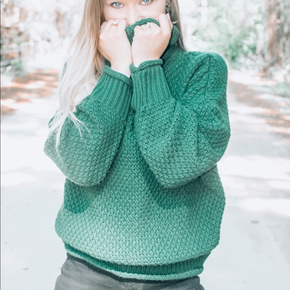 Green turtleneck sweater